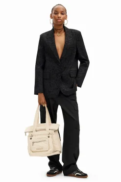 Blazer troqueada silueta flores