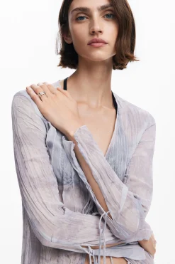 Blusa cuello pico volantes