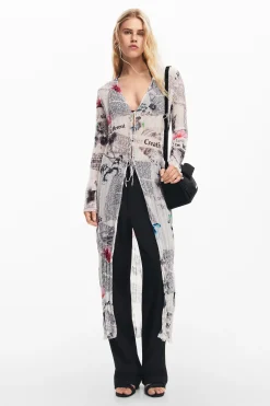 Blusa larga estampado periódico
