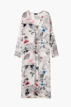 Blusa larga estampado periódico