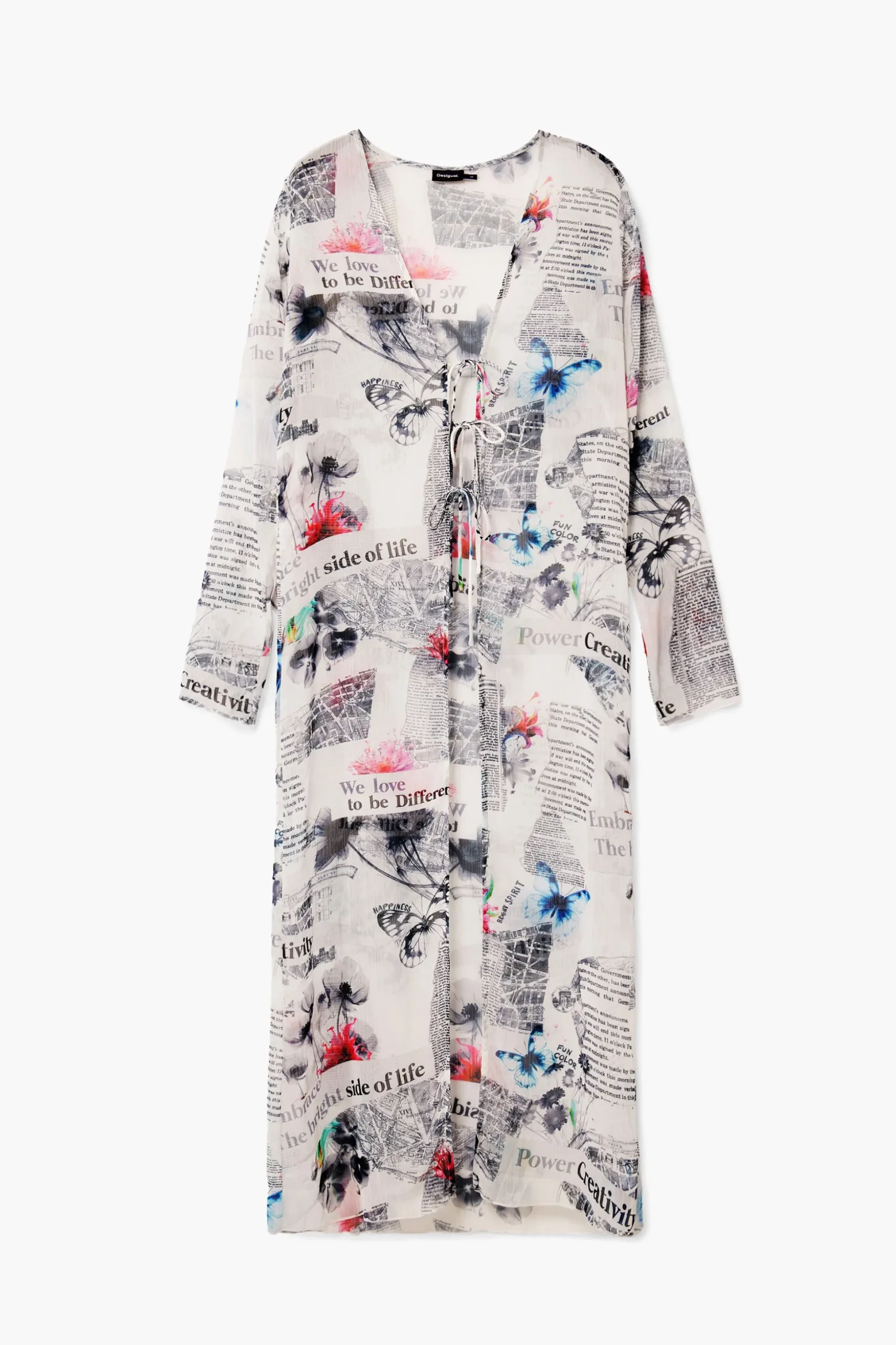 Blusa larga estampado periódico