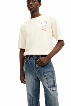 Pantalón denim parcheado
