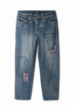 Pantalón denim parcheado