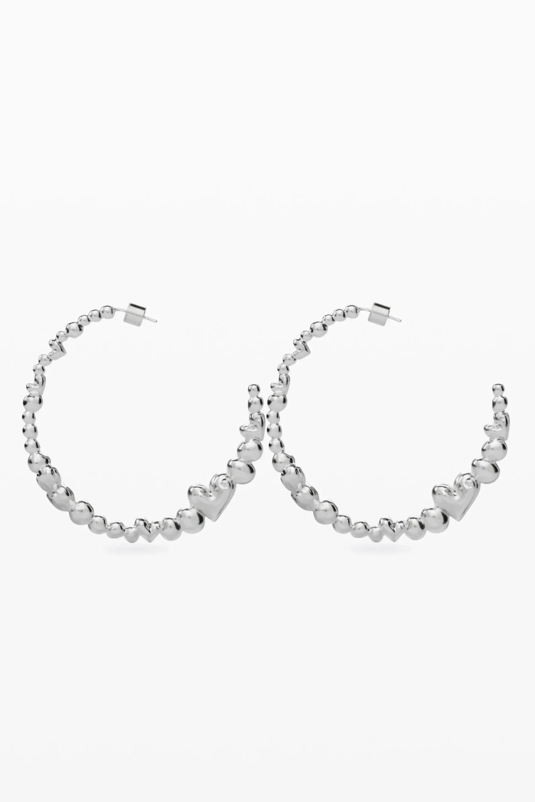 Pendientes aro corazones bañado en plata Zalio