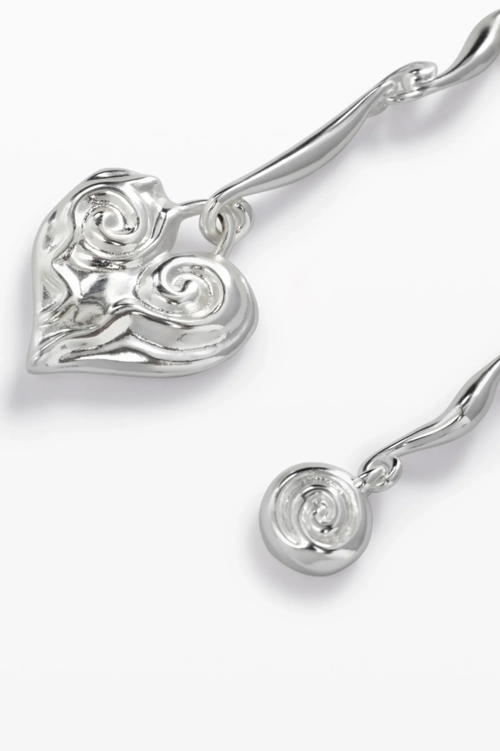 Pendientes asimétricos baño plata Zalio