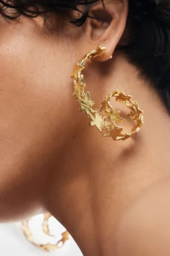 Pendientes espiral estrellas baño oro Zalio