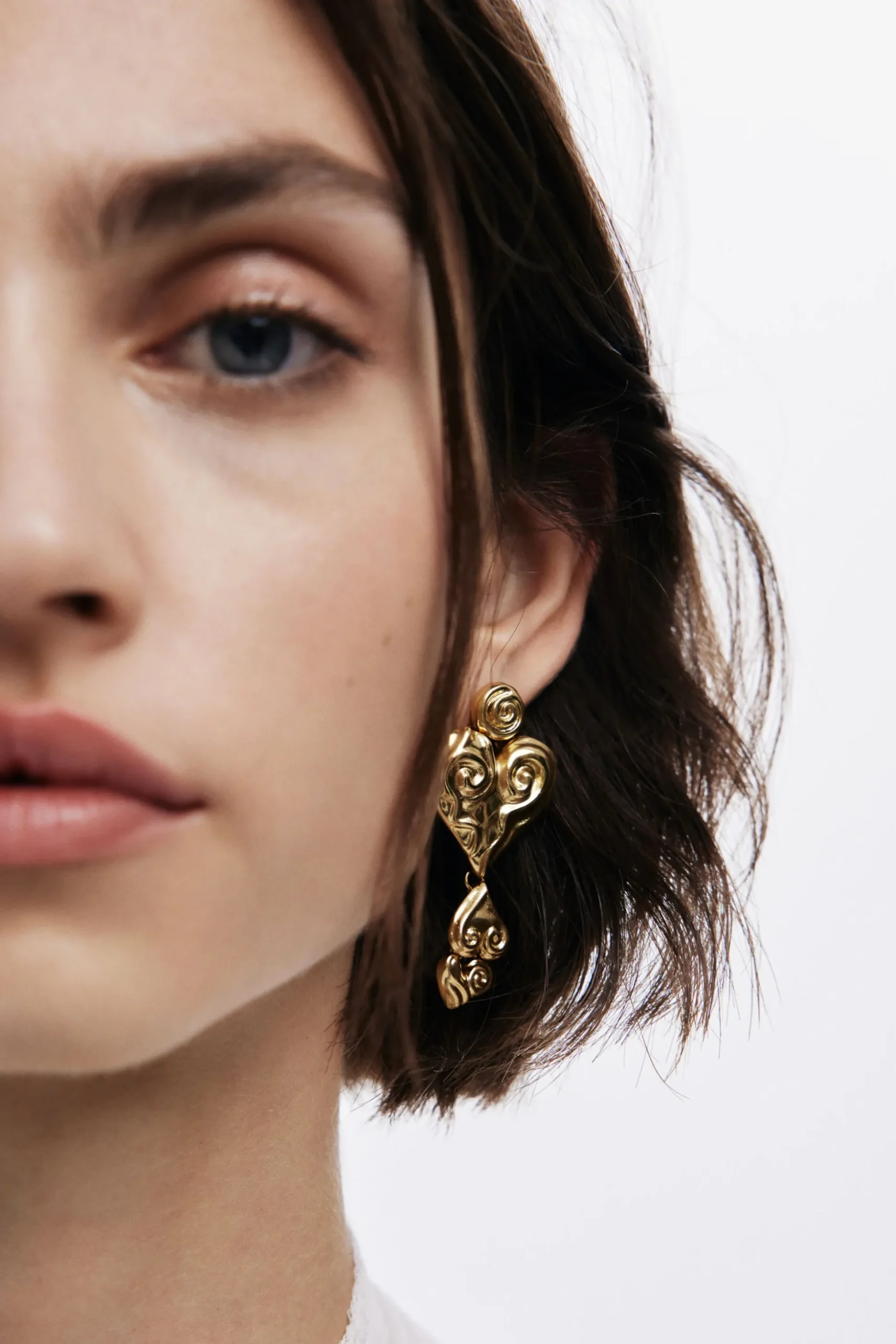 Pendientes triple corazón baño oro Zalio