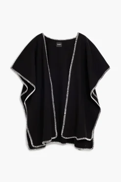 Poncho con bufanda