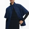 Poncho patrón geométrico
