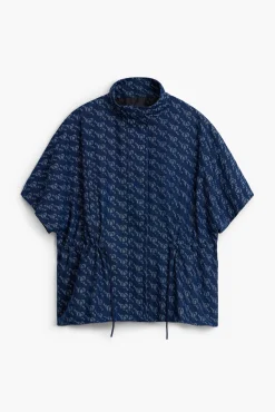 Poncho patrón geométrico
